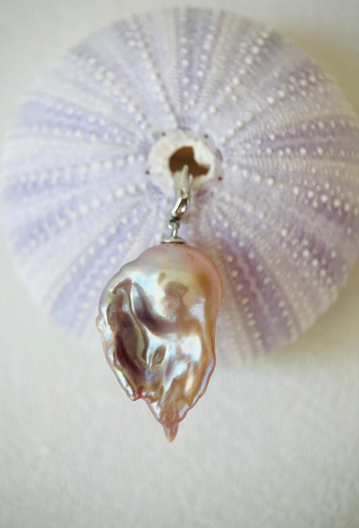 Pearl pendant on a white background