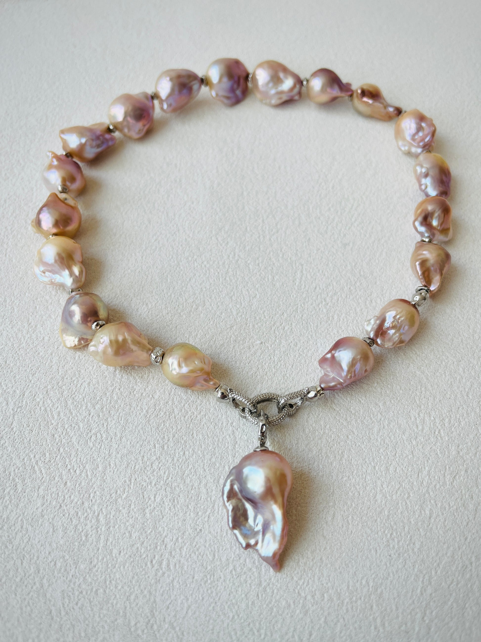 Pearl Necklace with Baroque charm on a light background