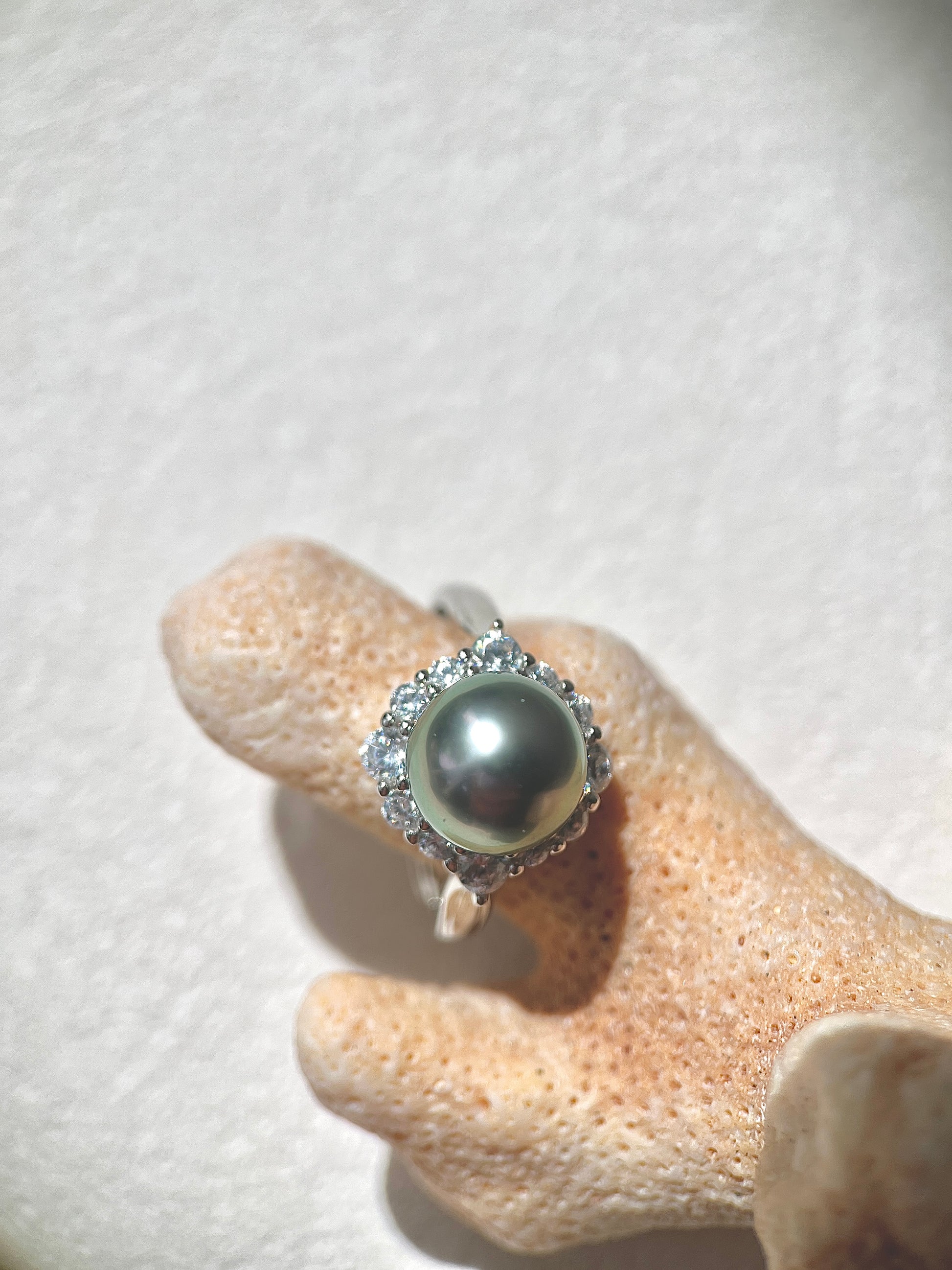 Tahitian Pearl ring on a mannequin hand with a white background