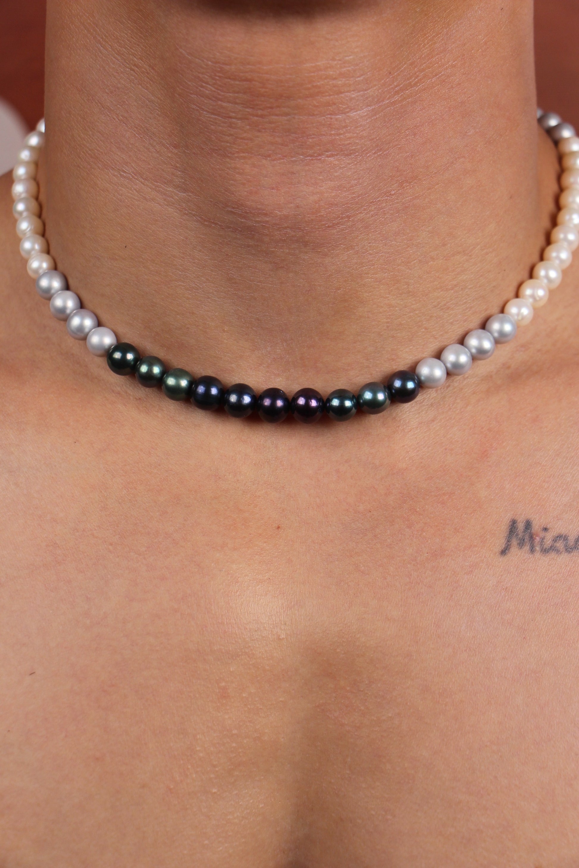 Men wearing a multicolor freshwater pearl necklace