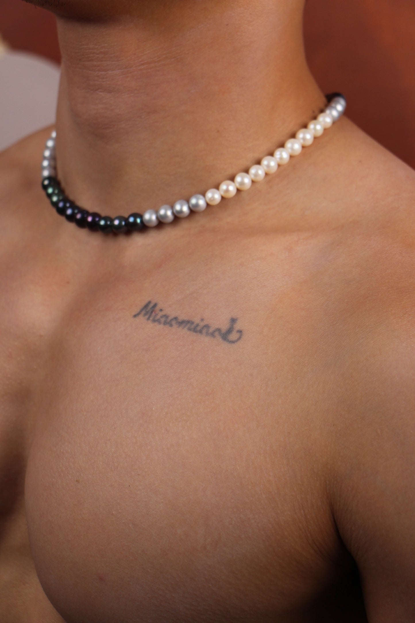 Men wearing a multicolor freshwater pearl necklace