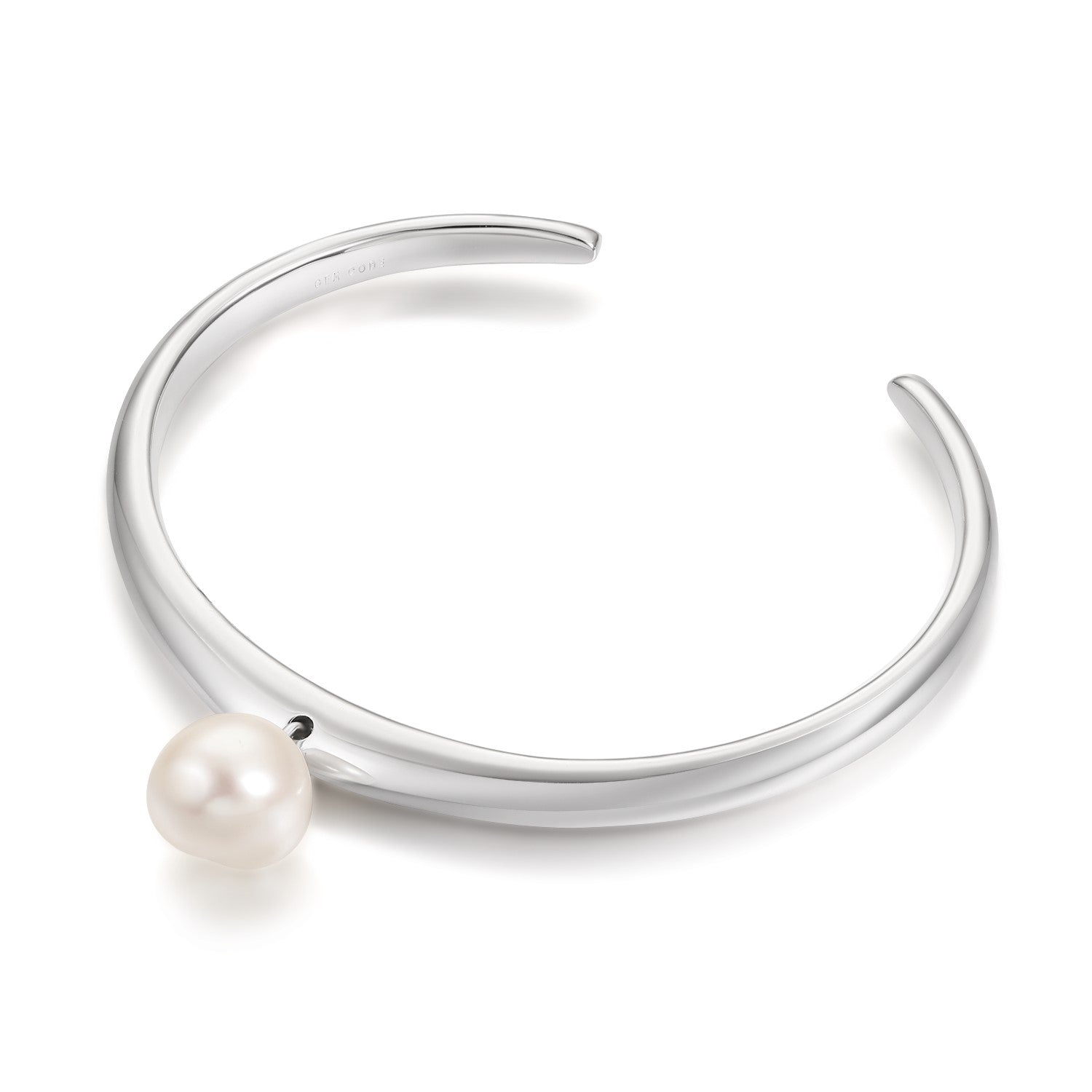 Silver bracelet with a white baroque pearl on a white background