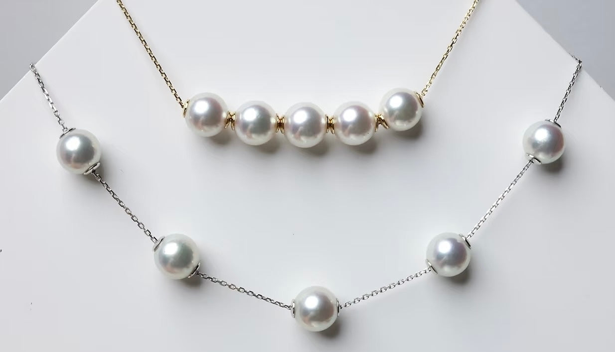 Adjustable freshwater pearl necklace with premium round pearls on 18K solid gold and silver chains.
