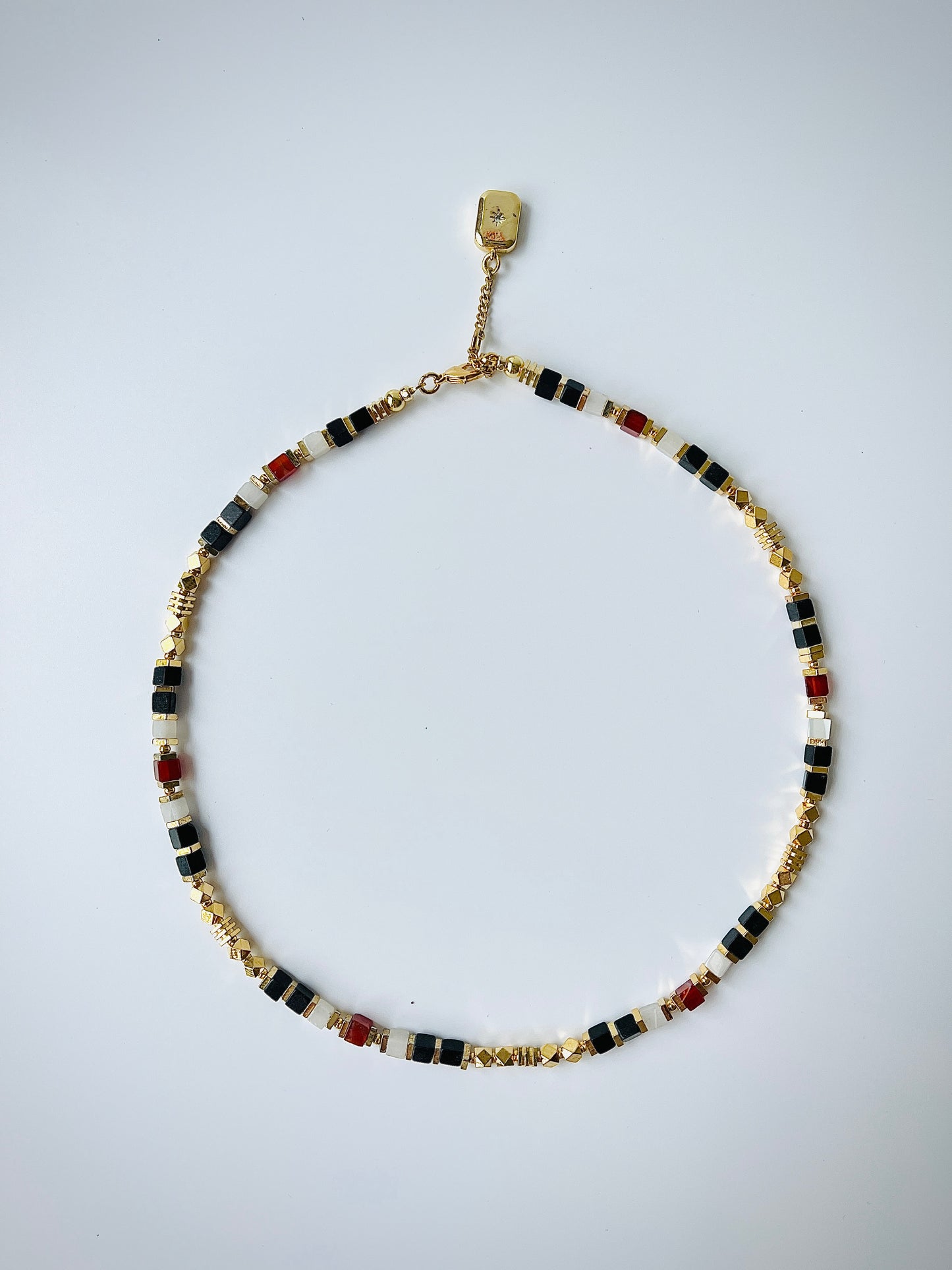 Colorful agate gemstone necklace on white ground