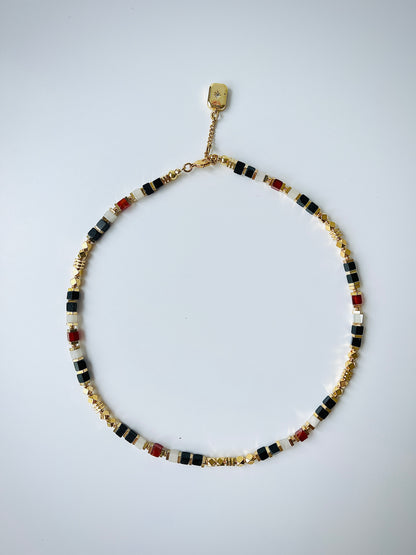 Colorful agate gemstone necklace on white ground