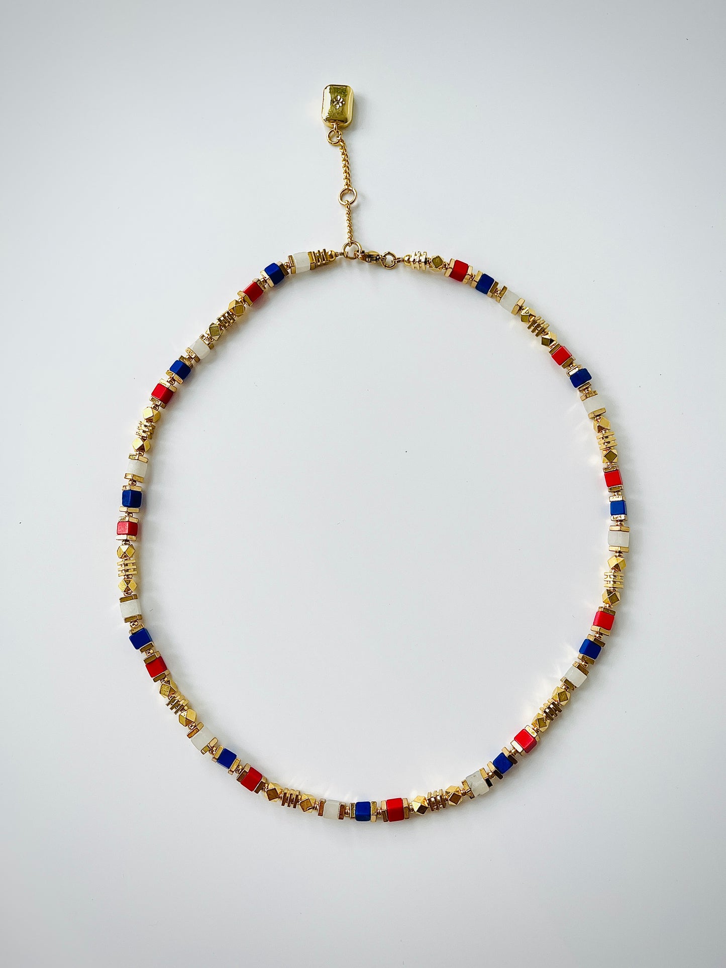 Colorful agate gemstone necklace on white background