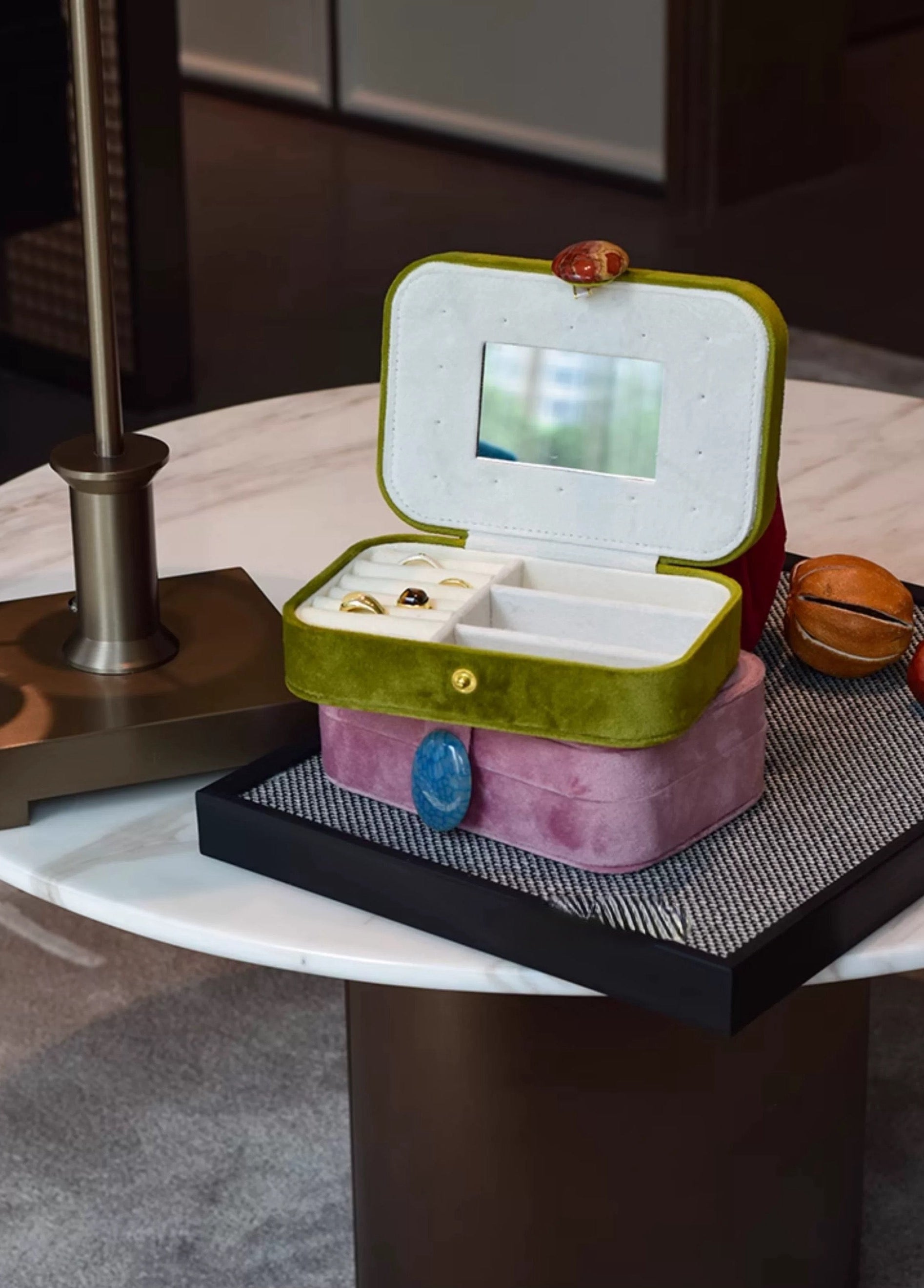 Jewelry box with a mirror on a table