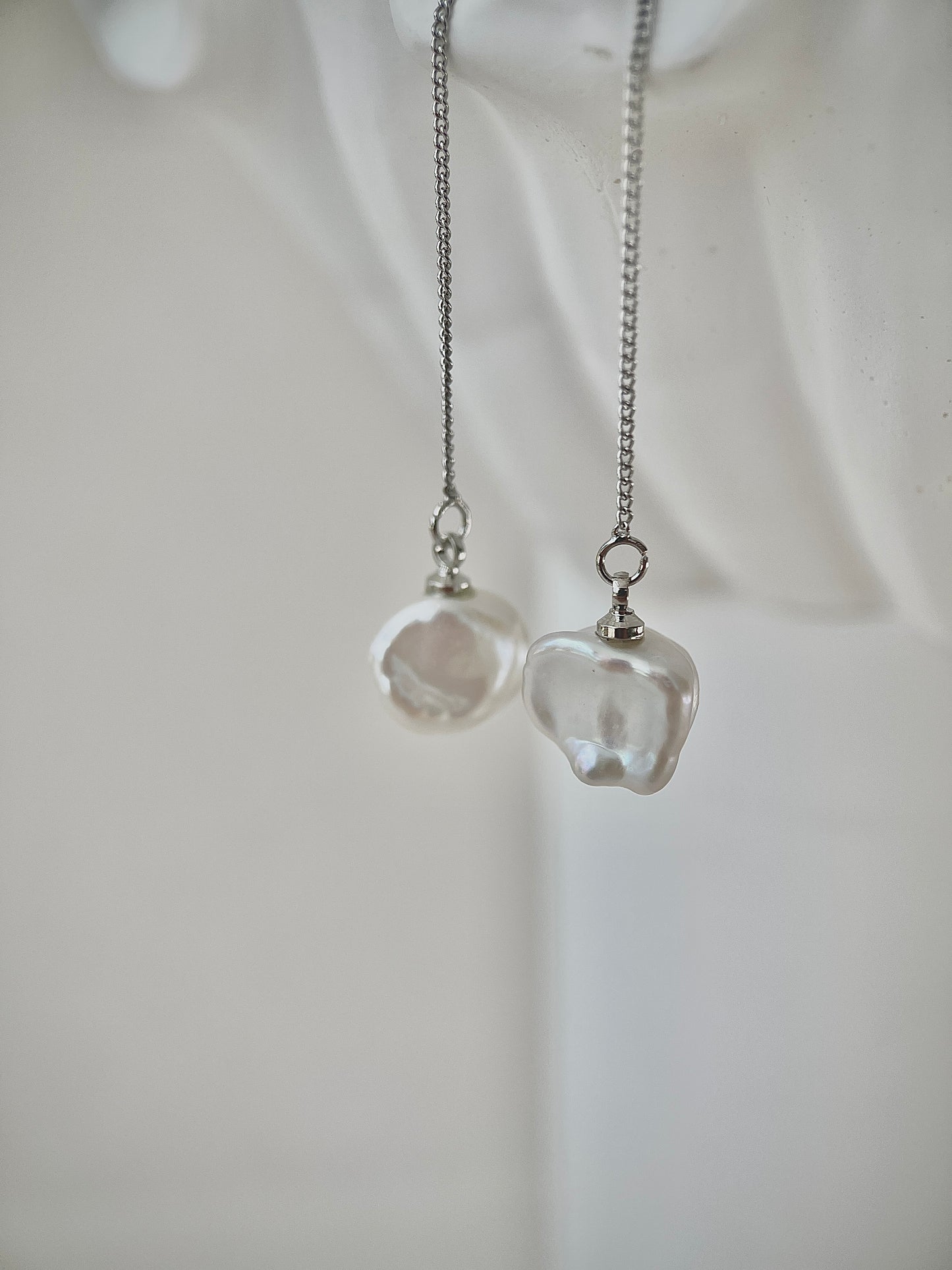 Silver Keshi Pearl Earrings in front of white background